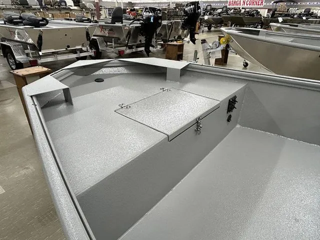 Slide: The Image of 2025 XTREME BOATS Brute 1754SS Tunnel interior, showcasing spacious deck and storage compartment. - 4