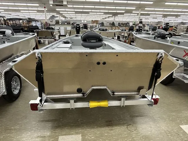 Slide: The Image of 2025 XTREME BOATS Brute 1754SS Tunnel displayed in showroom, rear view. - 9