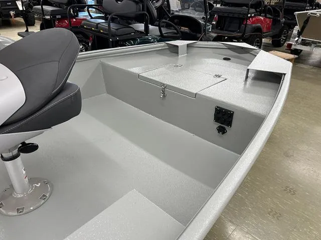 Slide: The Image of 2025 XTREME BOATS Classic 1854SS Tunnel interior with seating and storage compartments. - 1