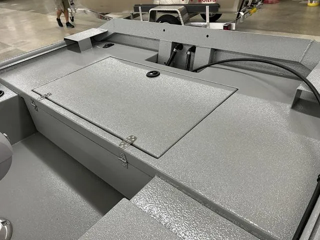 Slide: The Image of 2025 XTREME BOATS Classic 1854SS Tunnel interior, showcasing storage compartment and sleek design. - 5