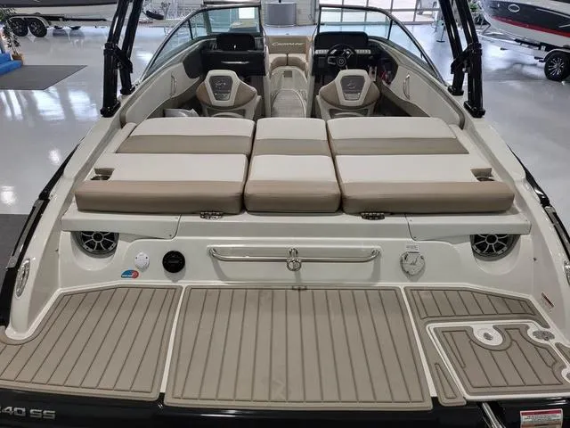 Slide: The Image of 2022 Crownline 240 SS SURF boat with spacious seating and modern design. - 4