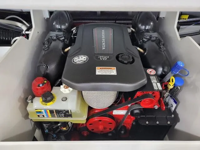 Slide: The Image of Engine compartment of 2022 Crownline 240 SS SURF with Volvo Penta 350 V8 engine. - 9