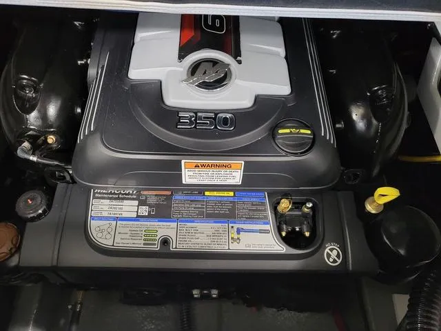 Slide: The Image of 2024 Crownline 280 SS engine compartment featuring a powerful 350 horsepower engine. - 8