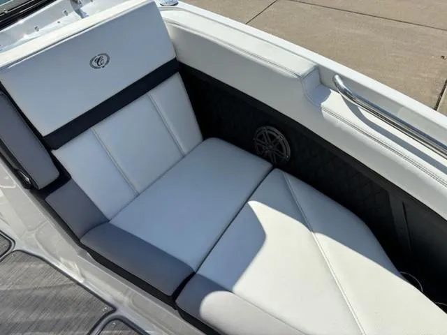 Slide: The Image of Luxurious seating in a 2021 Cobalt R8 boat, featuring white and black upholstery. - 11