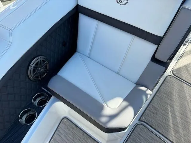 Slide: The Image of Luxurious seating in 2021 Cobalt R8 boat with speaker and cup holders. - 12