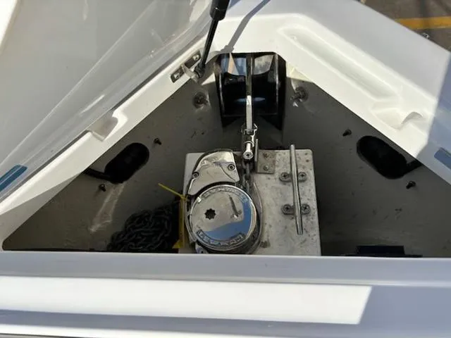 Slide: The Image of Anchor compartment of 2021 Cobalt R8 boat with winch and chain. - 13