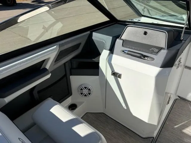 Slide: The Image of 2021 Cobalt R8 boat interior with modern dashboard and seating. - 7