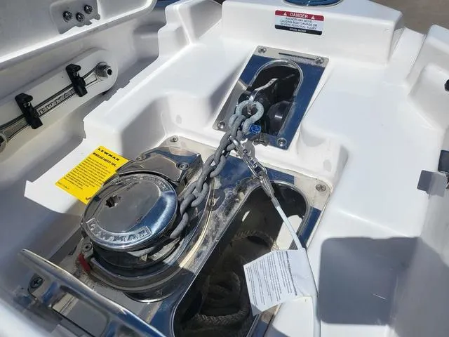Slide: The Image of 2022 Chaparral 28 Surf boat anchor system with chain and winch. - 11