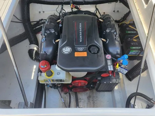 Slide: The Image of Engine compartment of 2022 Chaparral 28 Surf with Volvo Penta 380 V8 engine. - 19