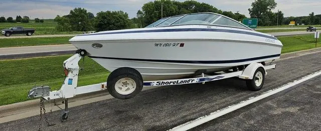Slide: The Image of 1998 Cobalt 200BR boat on ShoreLand'r trailer parked roadside. - 1