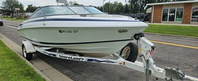 Slide: The Image of 1998 Cobalt 200BR boat on ShoreLand'r trailer parked on roadside. - 3