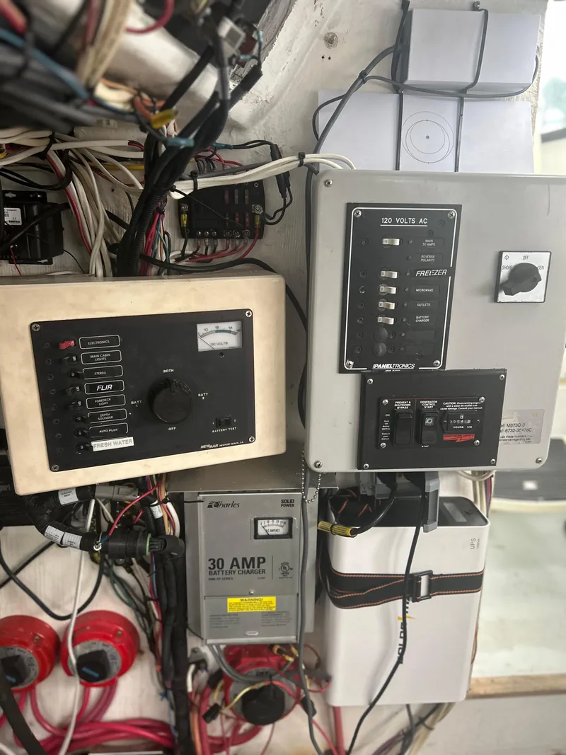 Slide: The Image of Electrical panel and wiring inside a 1998 Northern Bay Pilothouse 36 boat. - 9