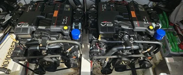 Slide: The Image of Twin MerCruiser V8 engines in a 1998 Formula Boats 330 SS. - 13