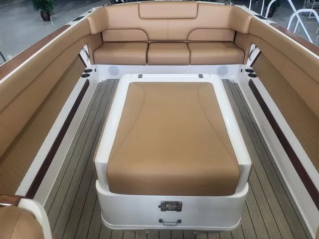 Slide: The Image of Luxurious interior of 2024 Thoroughbred u23i boat with tan leather seating. - 9