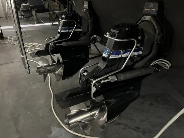 Slide: The Image of 2015 Formula Boats 400 Super Sport engines in a garage setting. - 3