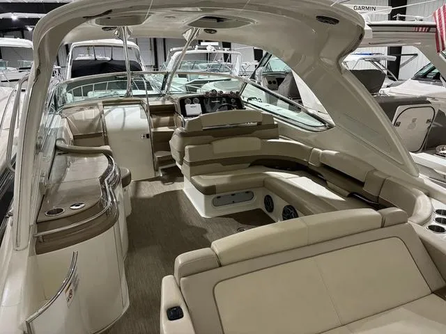 Slide: The Image of 2015 Formula Boats 400 Super Sport interior with luxurious seating and modern dashboard. - 5