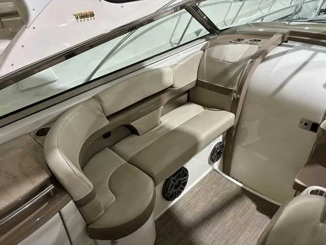 Slide: The Image of 2015 Formula Boats 400 Super Sport interior with beige seating and modern design. - 7