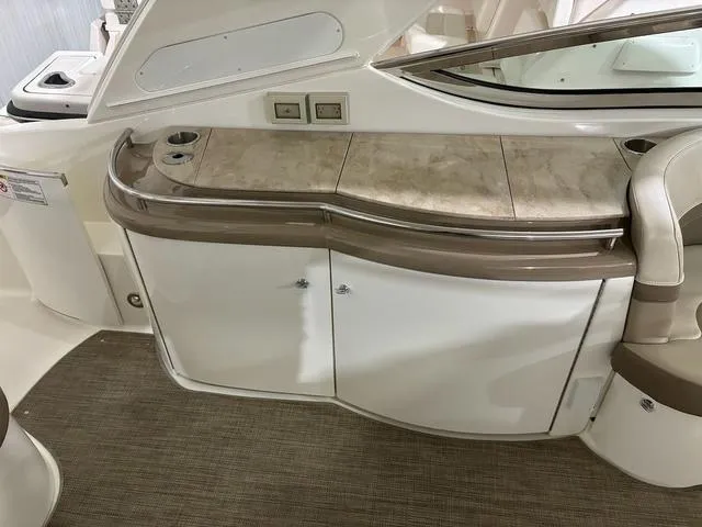 Slide: The Image of 2015 Formula Boats 400 Super Sport interior with sleek cabinetry and modern design. - 8