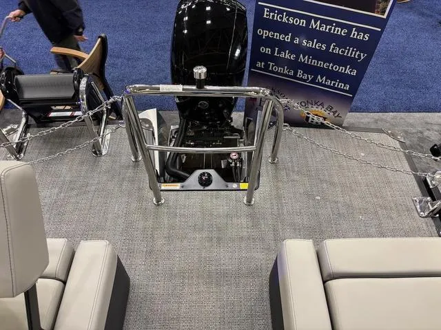 Slide: The Image of 2025 Barletta Boats C22M at Erickson Marine display, featuring motor and seating area. - 10
