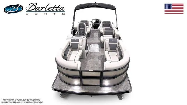 Slide: The Image of 2025 Barletta Boats C22M pontoon with luxurious seating and sleek design, featuring American flag. - 14