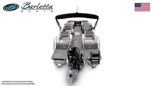 Slide: The Image of 2025 Barletta C22M boat with sleek design and modern seating, featuring a powerful outboard motor. - 15