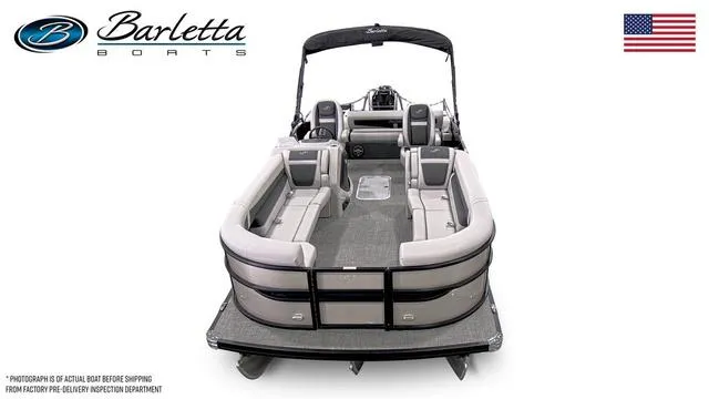 Slide: The Image of 2025 Barletta Boats C24uc pontoon with spacious seating and sleek design. - 3