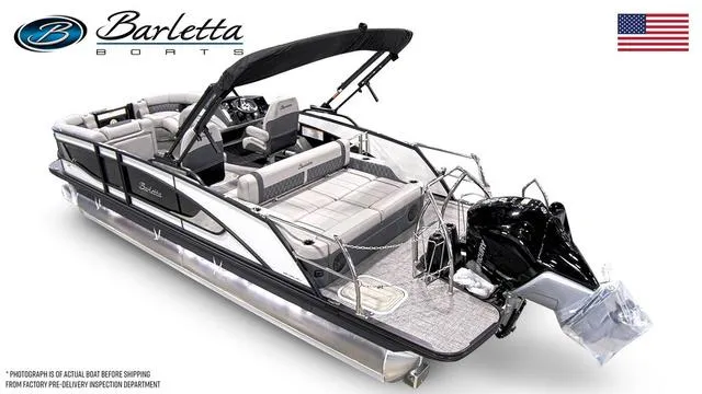 Slide: The Image of 2024 Barletta Boats Lusso L23UC pontoon with luxurious seating and sleek design. - 12