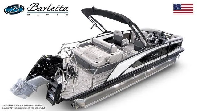 Slide: The Image of 2024 Barletta Boats Lusso L23UC luxury pontoon boat with sleek design and spacious seating. - 14