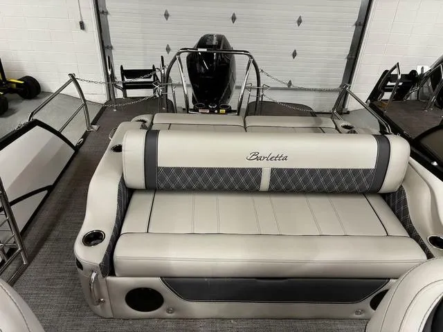 Slide: The Image of 2024 Barletta Lusso L23UC boat interior with luxurious seating and modern design. - 7