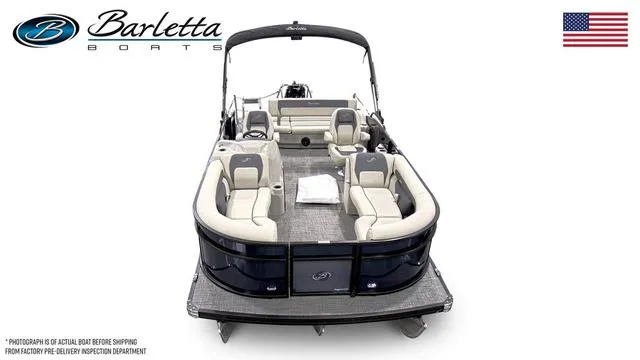 Slide: The Image of 2024 Barletta Boats Aria A22UC pontoon with luxurious seating and sleek design. - 2