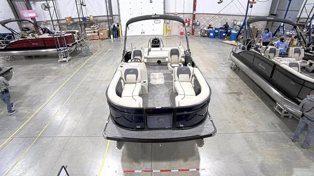 Slide: The Image of 2024 Barletta Aria 22UC pontoon boat in a manufacturing facility. - 5