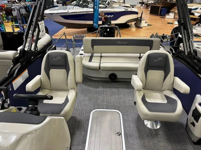 Slide: The Image of 2024 Barletta Aria A22UC boat interior with plush seating and modern design. - 6
