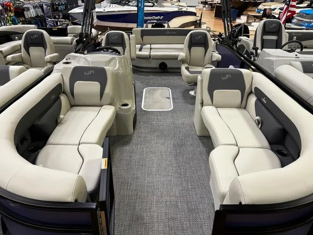 Slide: The Image of 2024 Barletta Aria A22UC pontoon boat with spacious seating and modern design. - 7