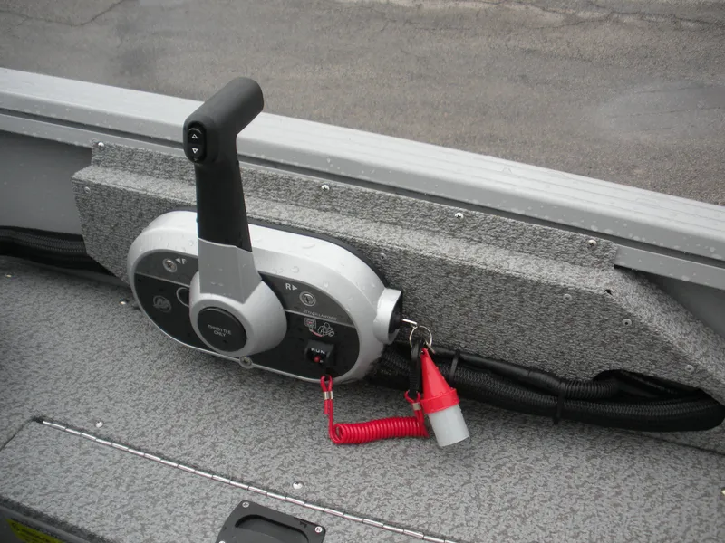 Slide: The Image of 2024 Smoker Craft Freedom 180 SC boat throttle control with safety lanyard. - 6