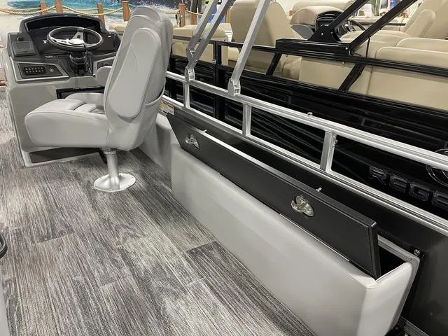 Slide: The Image of 2025 Ranger 220FC boat interior with modern seating and sleek design. - 29