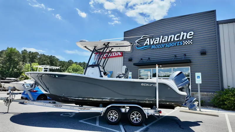 Slide: The Image of 2021 Sea Fox 248 Commander boat on trailer at Avalanche Motorsports dealership. - 0