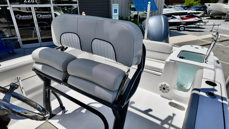 Slide: The Image of 2021 Sea Fox 248 Commander boat interior with cushioned seating and modern design. - 12