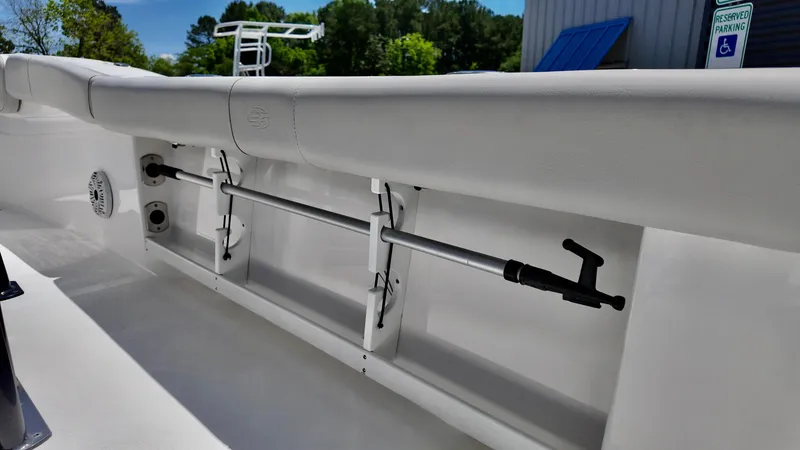 Slide: The Image of 2021 Sea Fox 248 Commander boat interior with rod holders and seating. - 14