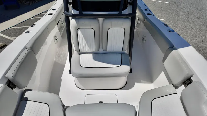 Slide: The Image of 2021 Sea Fox 248 Commander boat interior with cushioned seating and sleek design. - 18