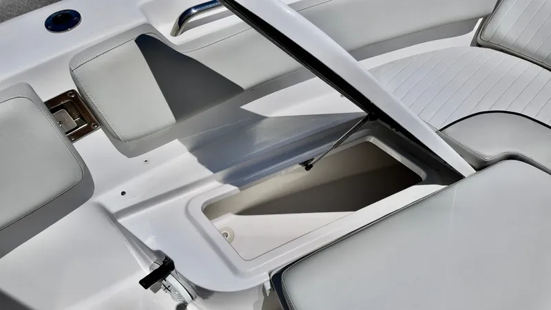 Slide: The Image of 2021 Sea Fox 248 Commander boat interior storage compartment open. - 6