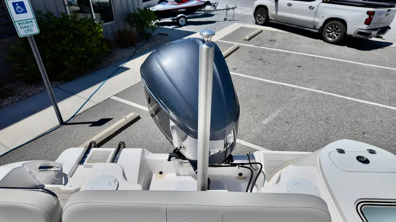 Slide: The Image of 2021 Sea Fox 248 Commander boat with outboard motor in a parking lot. - 8