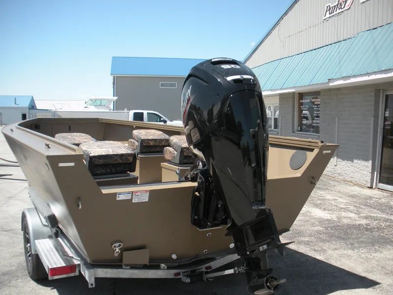 Slide: The Image of 2024 Smoker Craft Pro Sportsman 1872 T boat with powerful outboard motor. - 5