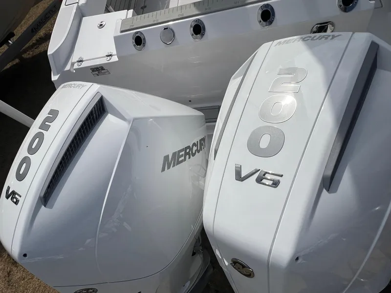 Slide: The Image of Twin Mercury 200 V6 outboard engines on a 2025 Blackfin 252 CC boat. - 6