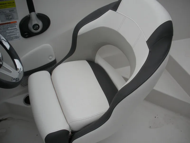 Slide: The Image of 2024 Starcraft SVX 190 OB DC boat seat, white and gray upholstery, modern design. - 5