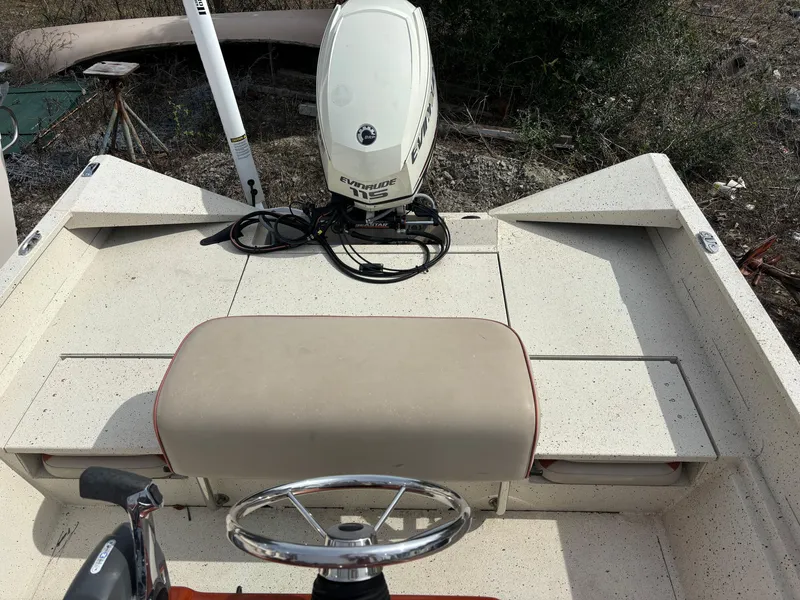 Slide: The Image of 2016 Alumacraft 2072 Bay boat with Evinrude motor and steering wheel. - 12