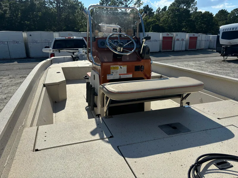 Slide: The Image of 2016 Alumacraft 2072 Bay boat with center console and seating, parked outdoors. - 3