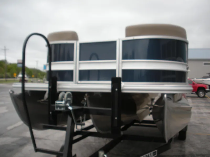 Slide: The Image of 2024 Sylvan Mirage 820 LZ pontoon boat on trailer, featuring sleek design and modern build. - 3