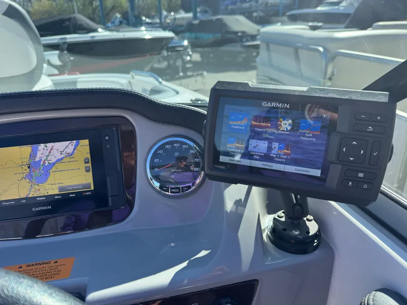 Slide: The Image of Dashboard of 2020 Chaparral 21 SSi Ski & Fish OB with Garmin navigation systems. - 14