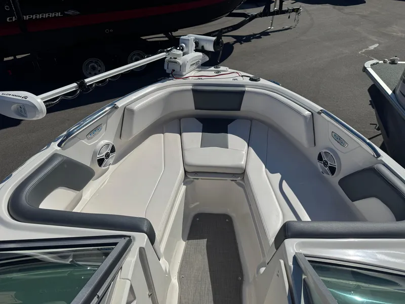 Slide: The Image of 2020 Chaparral 21 SSi Ski & Fish OB boat interior with seating and speakers. - 9