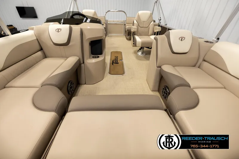 Slide: The Image of 2024 Tahoe 2185 LTZ QL pontoon boat interior with luxurious seating and modern design. - 13